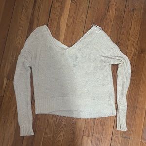 UO | Cross-back beige sweater